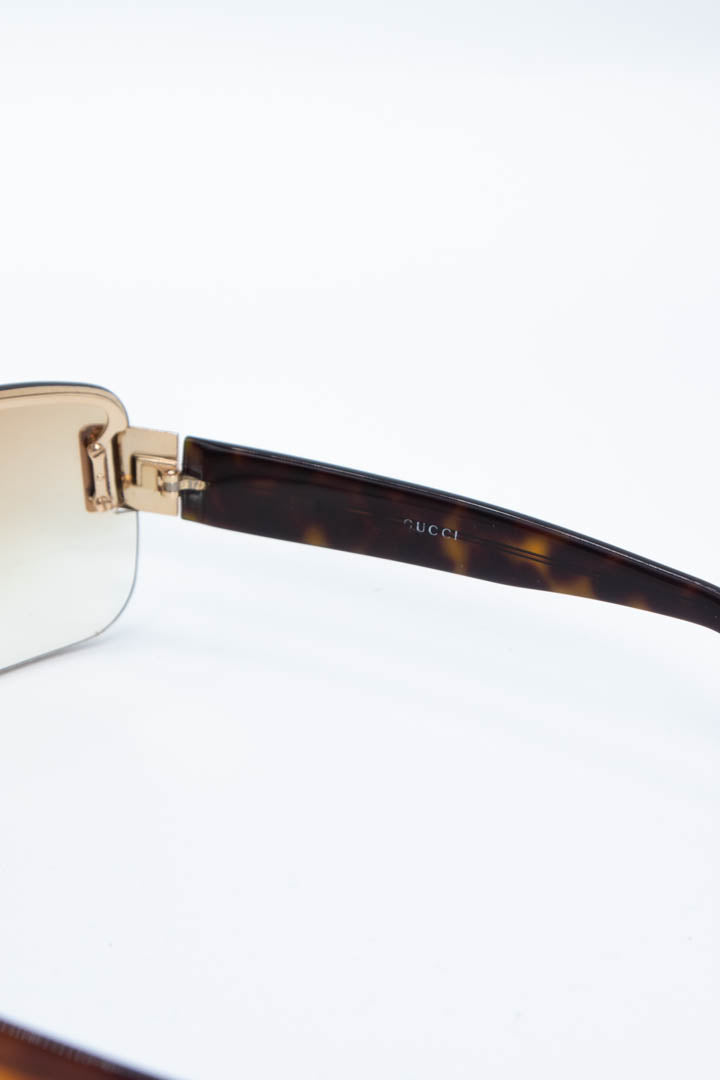 Image of Gucci Tortoiseshell Rimless Sunglasses GG1798S